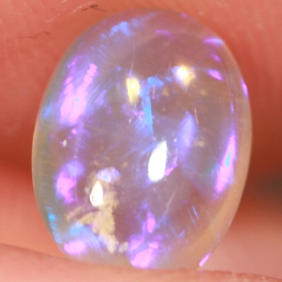 SOLID CRYSTAL OPAL Transparent with rich purple within